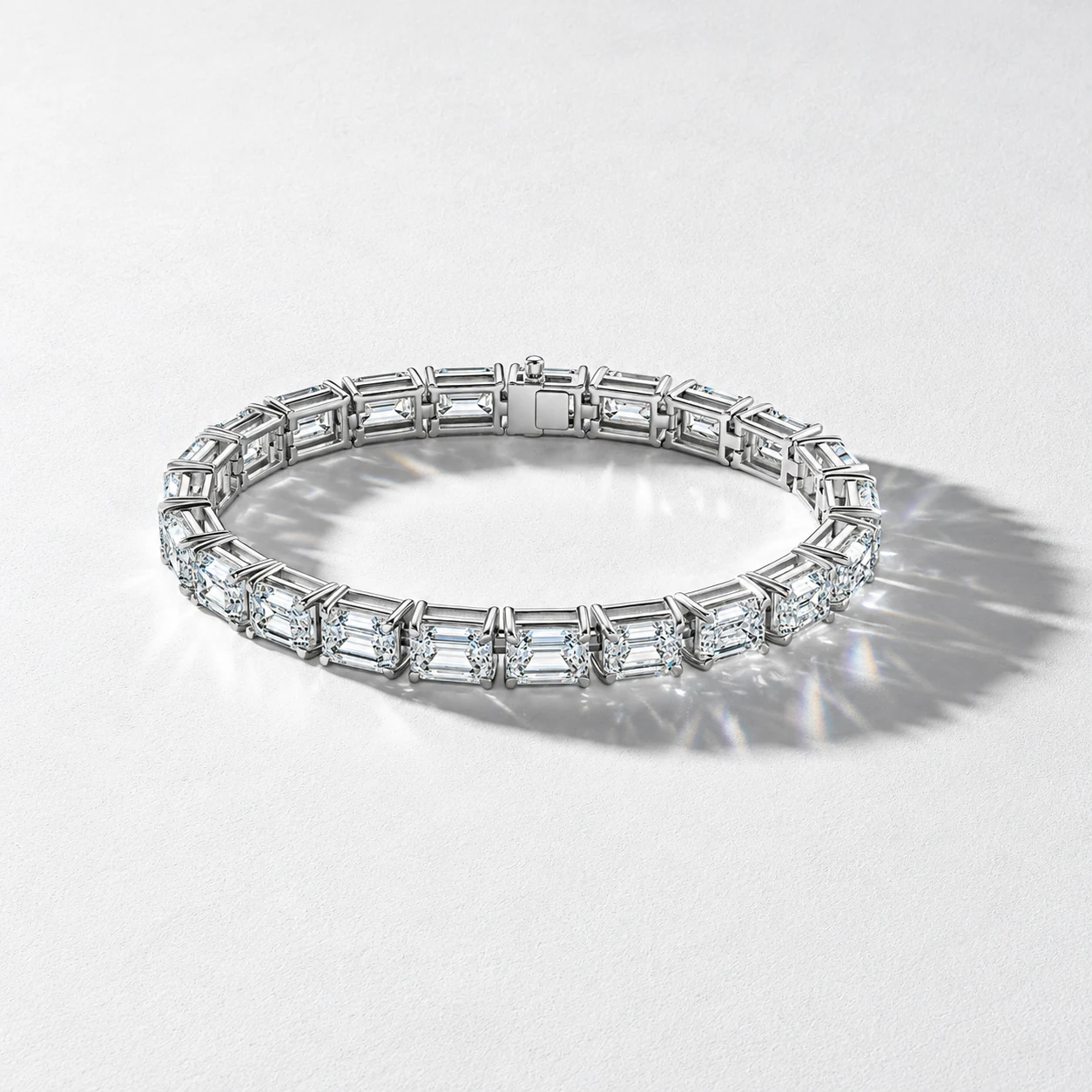 A rectangular-stone bracelet arranged on a white textured background