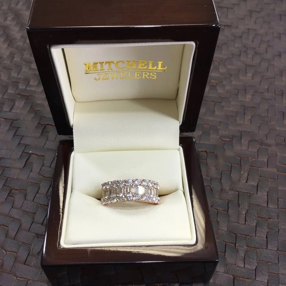 Diamond engagement rings shared by Mitchell Jewelers, photo 9