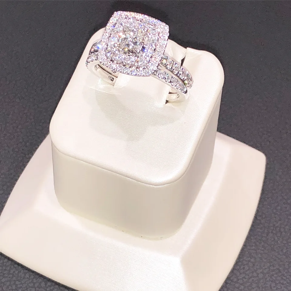 Wedding rings shared by Mitchell Jewelers, photo 2