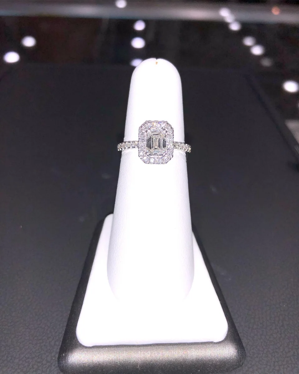 Diamond halo ring on display at Mitchell Jewelers